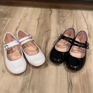 Pair of dress shoes. Black and white. Size 11.